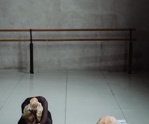 View of a person performing a deep stretch.